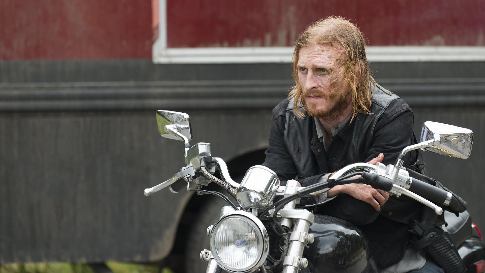 Dwight sitting on Daryl's motorcycle on The Walking Dead