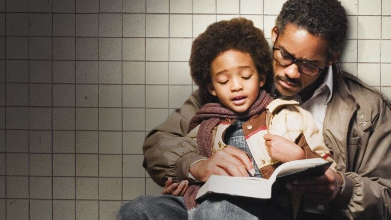 Chris reading to his son
