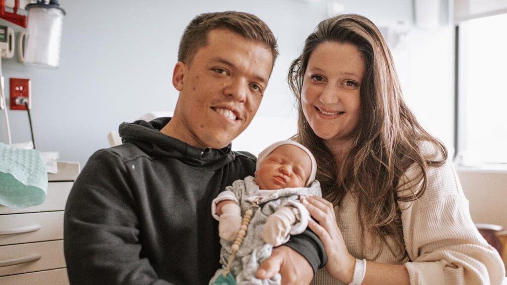 Zach and Tori Roloff holding their newborn son
