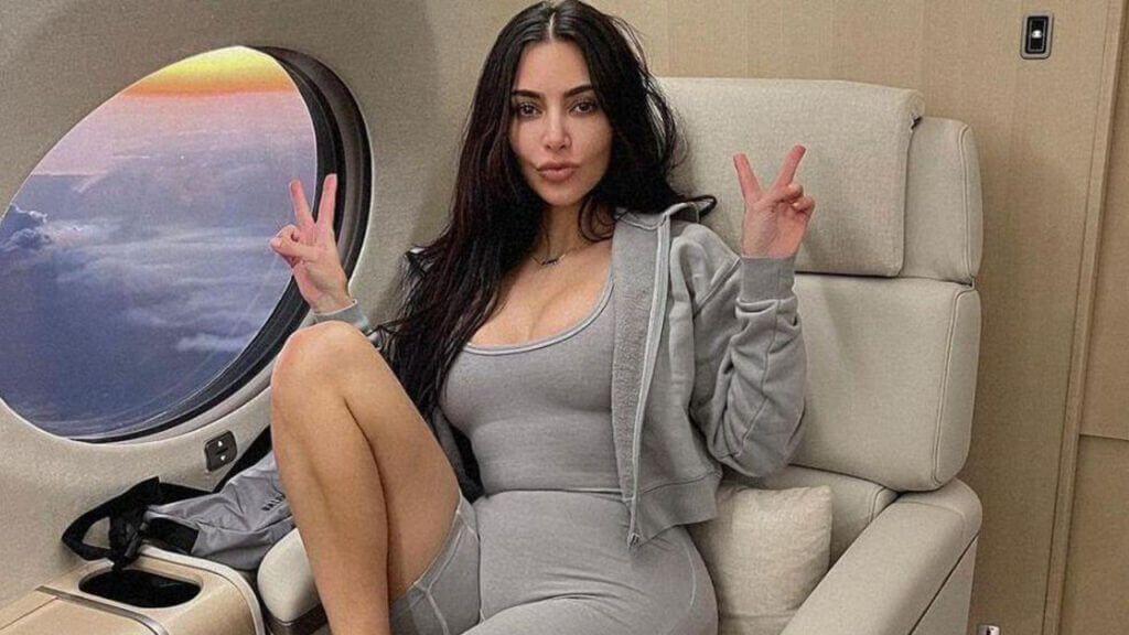 Kim Kardashian poses inside a plane Kim and Kids Tokyo trip