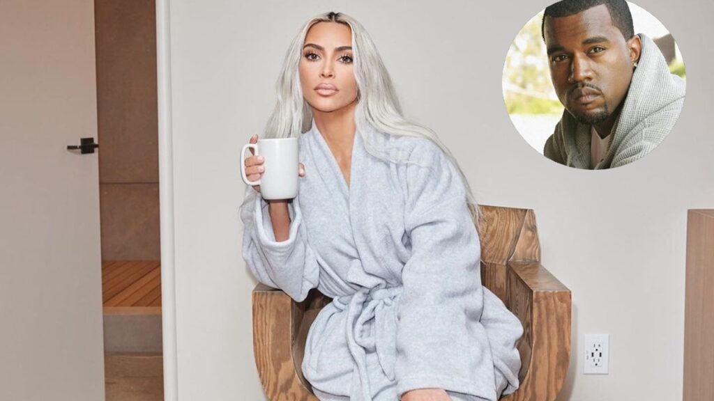 Kim Kardashian in a bathrobe holding a mug and Kanye West cutout