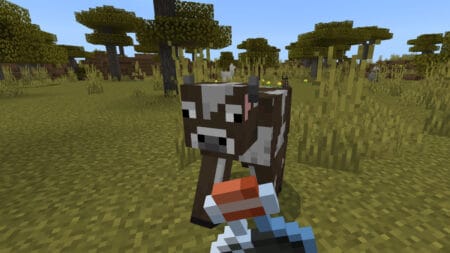 The player holds a Potion of Weakness in front of a cow in Minecraft