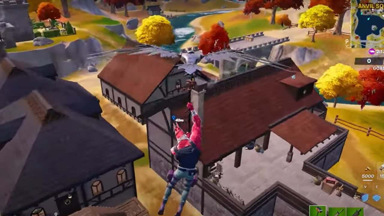 Fortnite: How to Inspect the Wall Under the East Building in Chapter 4