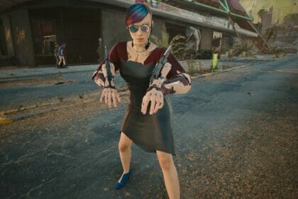 V poses with her Mantis Blades in Cyberpunk 2077