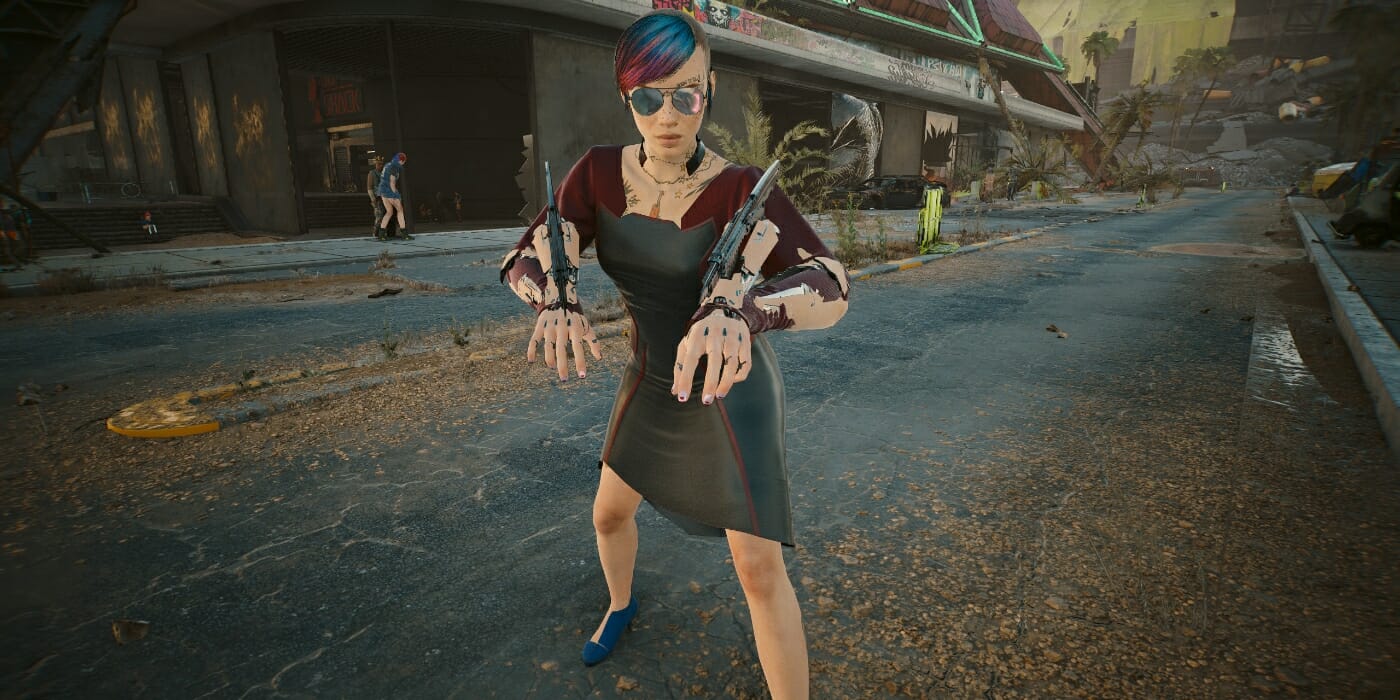 V poses with her Mantis Blades in Cyberpunk 2077
