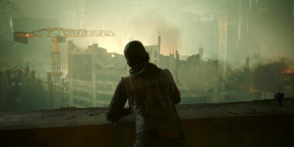 A character looks out over Dogtown amidst the rain in Cyberpunk 2077: Phantom Liberty