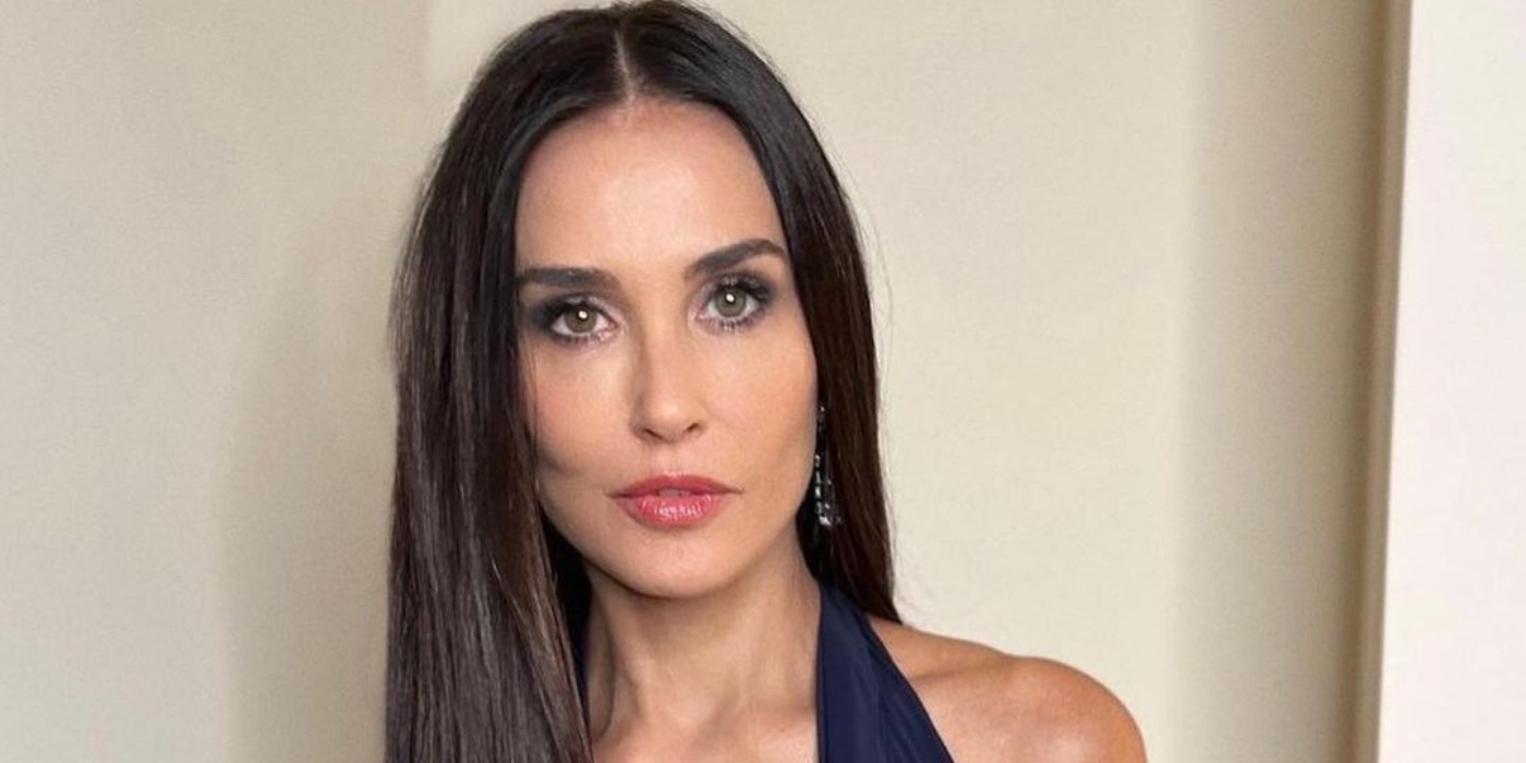 Demi Moore shows radiant skin in halter dress to attend a show