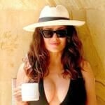 Salma Hayek rocks cowboy hat and glasses in video