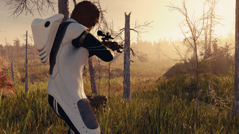 The main character aiming their rifle in a wooded area in Starfield