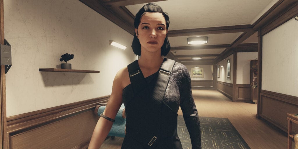 Andreja walks down the hallway of the Lodge in Bethesda's new sci-fi RPG
