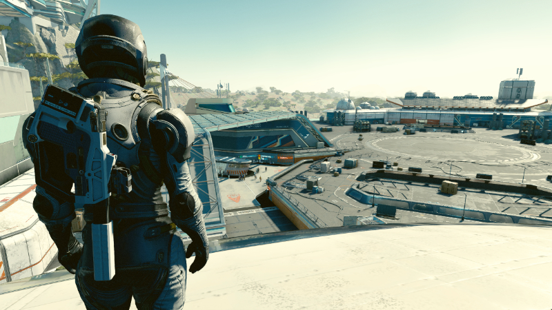 The Starborn looks down upon the city from atop their ship in Starfield, wearing the suit unlocked in New Game Plus