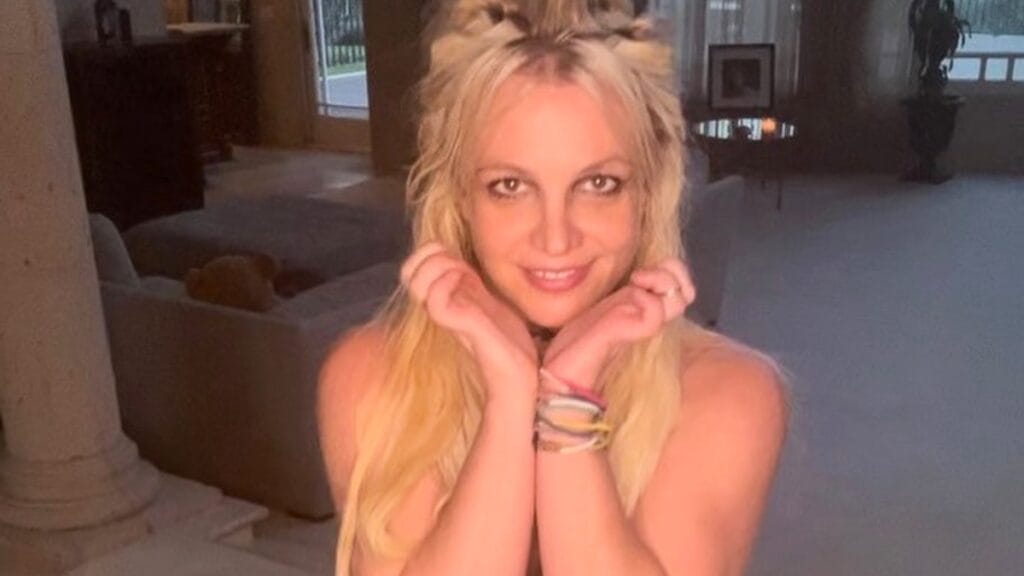 Britney spears poses while recoding a dance video