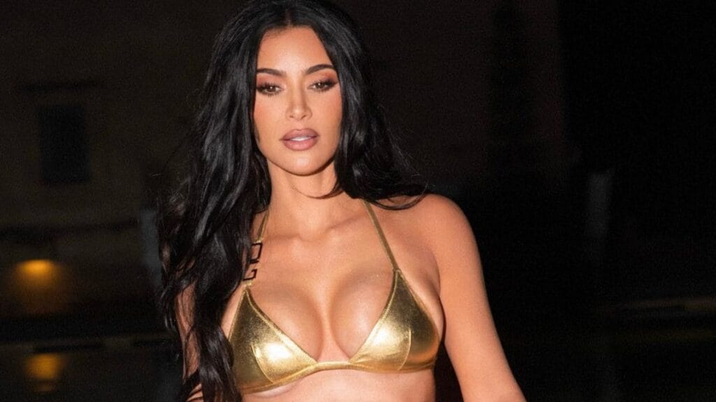 SKIMS CEO Kim Kardashian in gold bikini