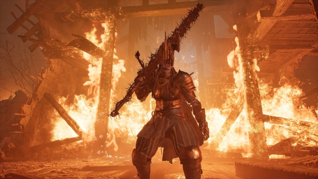 The Lampbearer stands in a burning building in Lords of the Fallen