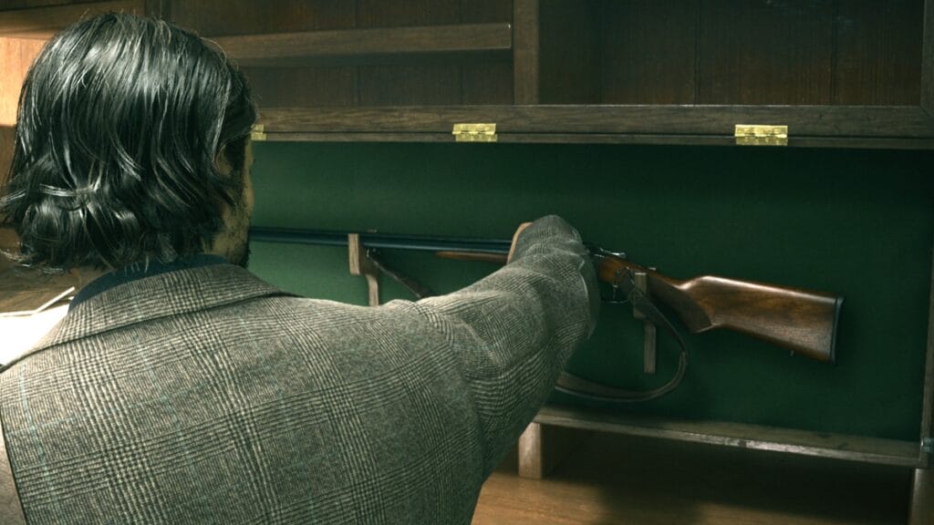 Alan grabs a gun from a case in Alan Wake 2
