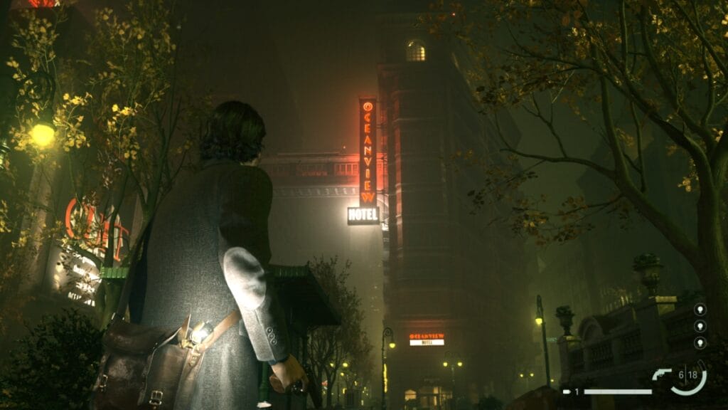 Alan approaches a hotel in Alan Wake 2