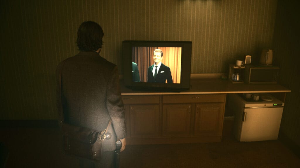 Alan watches TV in Alan Wake 2