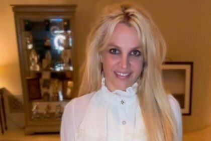 Britney poses in white shirt