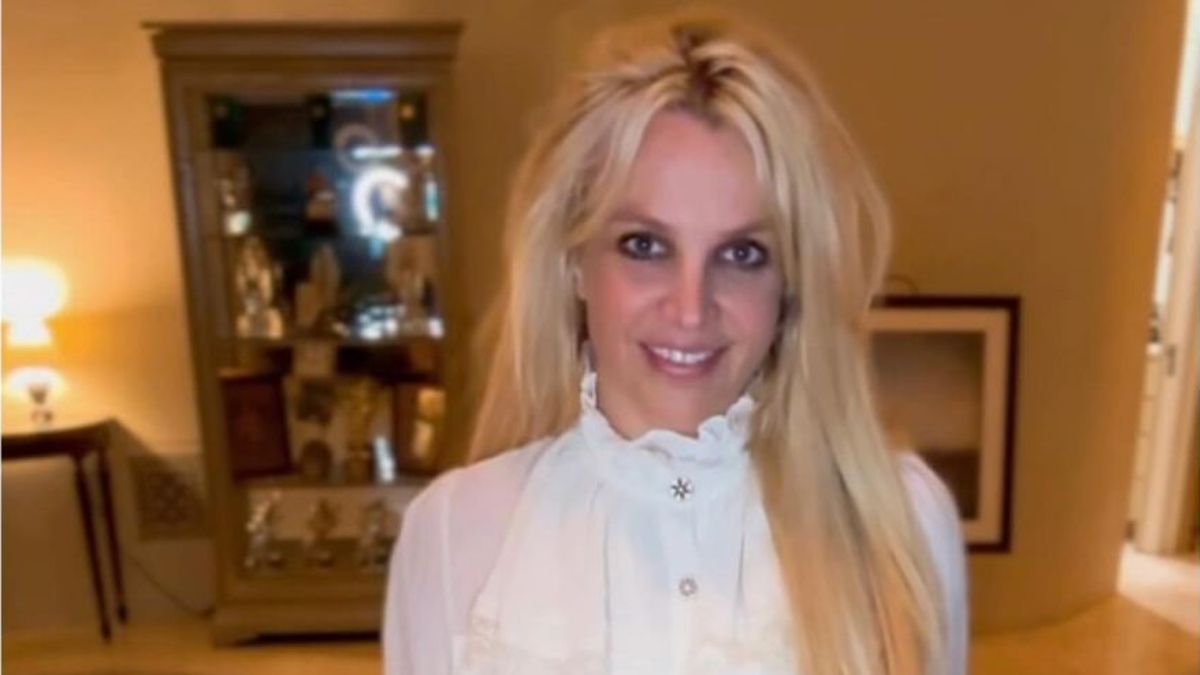 Britney poses in white shirt