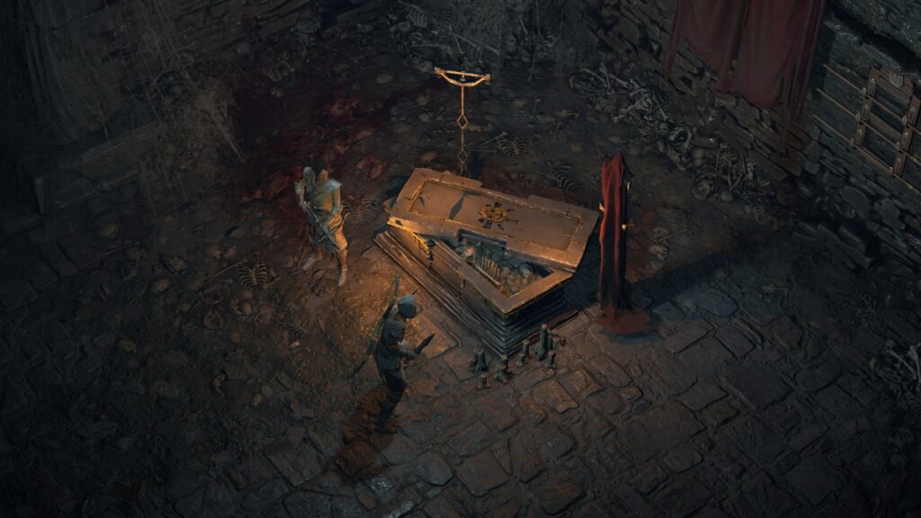 Characters stand beside a crypt in Diablo 4, one the most mediocre games of 2023