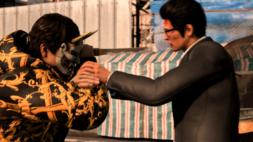 A masked man trie to stab Kiryu in Like a Dragon Gaiden: The Man Who Erased His Name