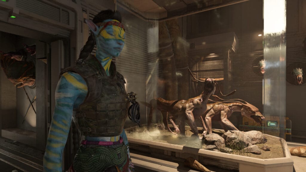 The main character stands in front of a display case in Avatar:: Frontiers of Pandora