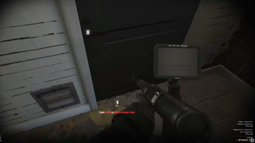 The player uses their Optiwand on a door in Ready or Not