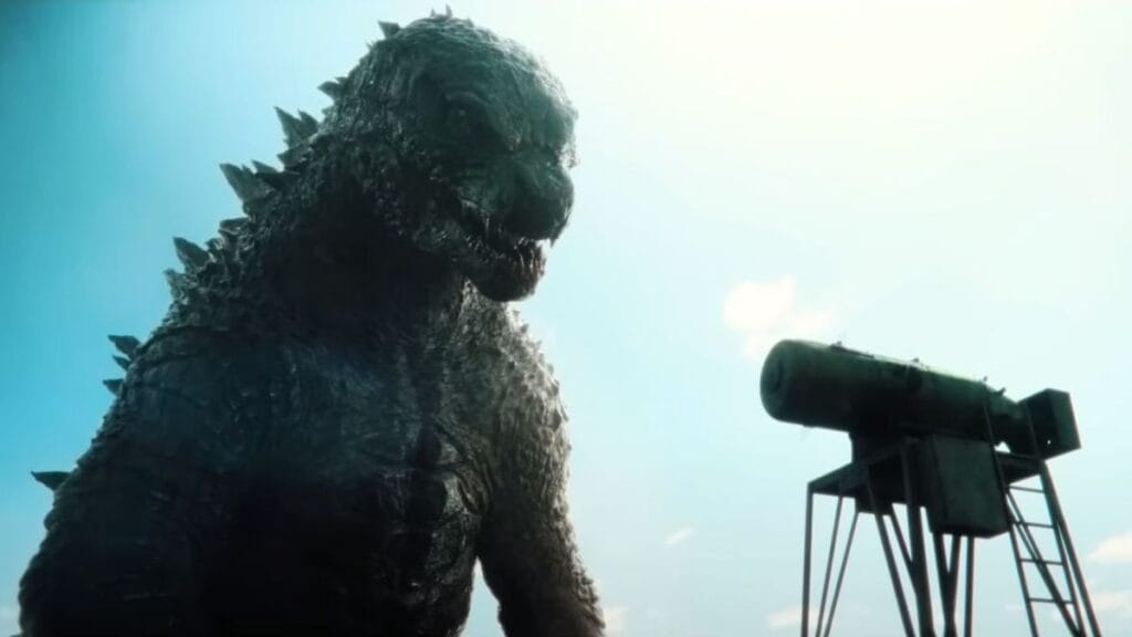 A shot of Godzilla and a nuclear bomb