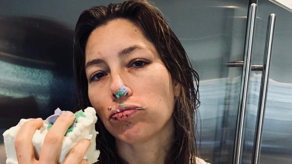 Jessica Biel eating a snack in the shower