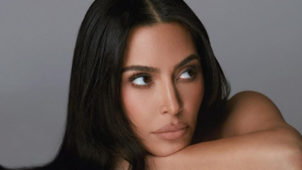 Kim Kardashian posing for SKKN promotional photos in Bkini