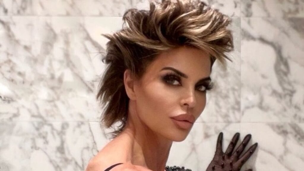 Lisa Rinna in black dress and hand gloves for Instagram photo