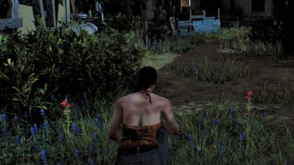 Julie sneaking through the grass in The Texas Chain Saw Massacre