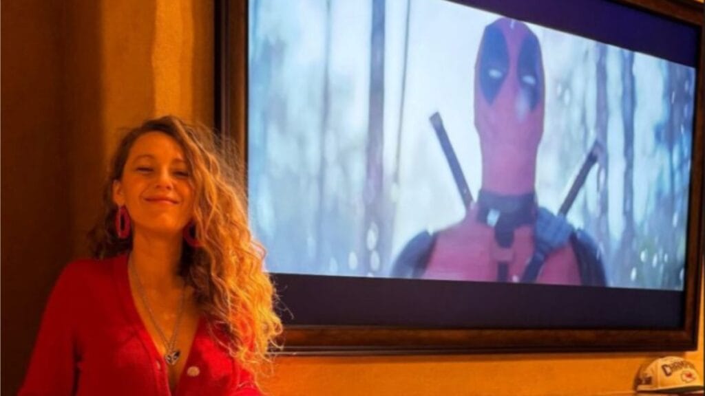 Blake Lively home and watching the Deadpool trailer