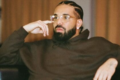 Drake wearing a brown hoodie Instagram photo.