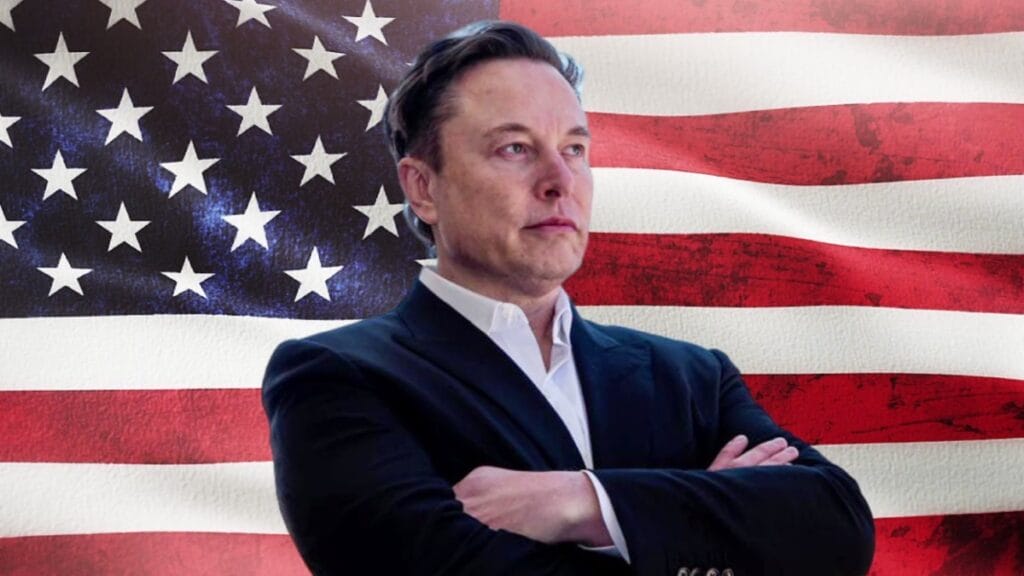 Elon Musk in front of an American flag
