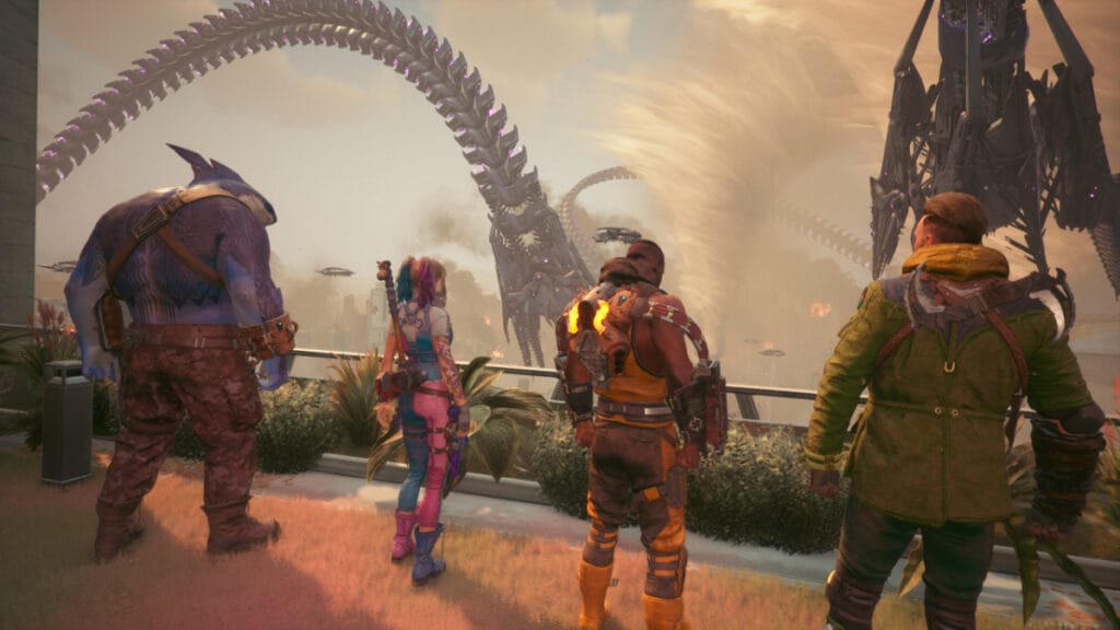 The squad stands with their backs to the camera, watching an alien invasion of the city