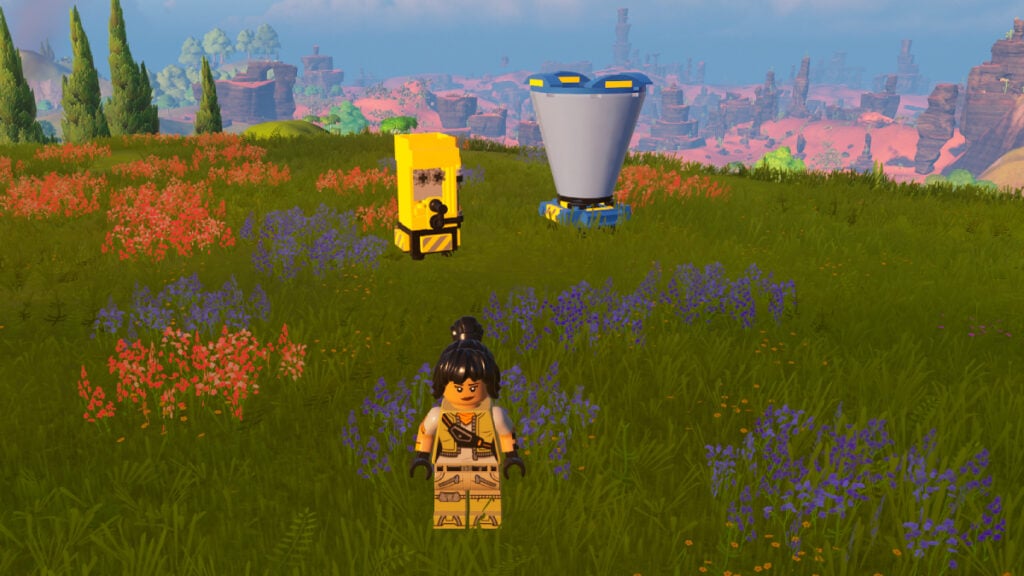 Lego Fortnite character standing infront of the Juicer and Food Processor