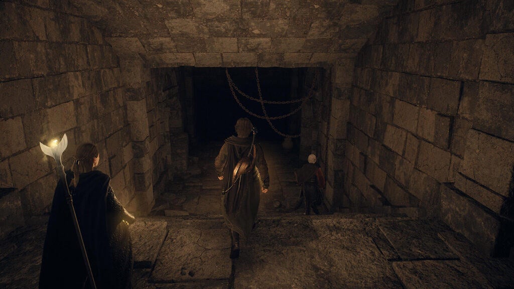 The Arisen and his party explore the halls of the Ancient Battleground Outpost.