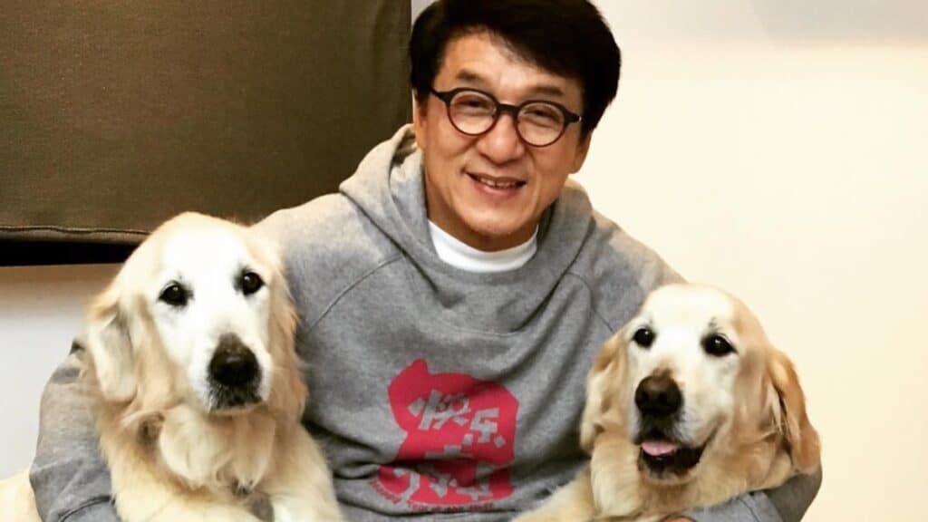 Jackie Chan with dogs JJ and Jones