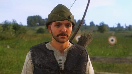 Henry stands on a hillside with his bow in Kingdom Come Deliverance