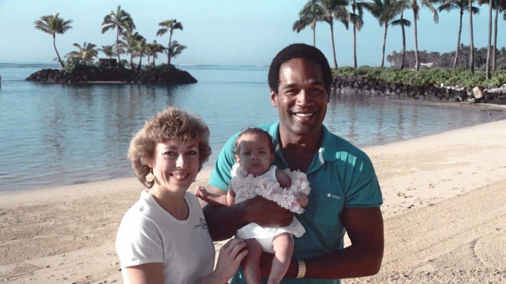 O.J Simpson with a baby and a woman