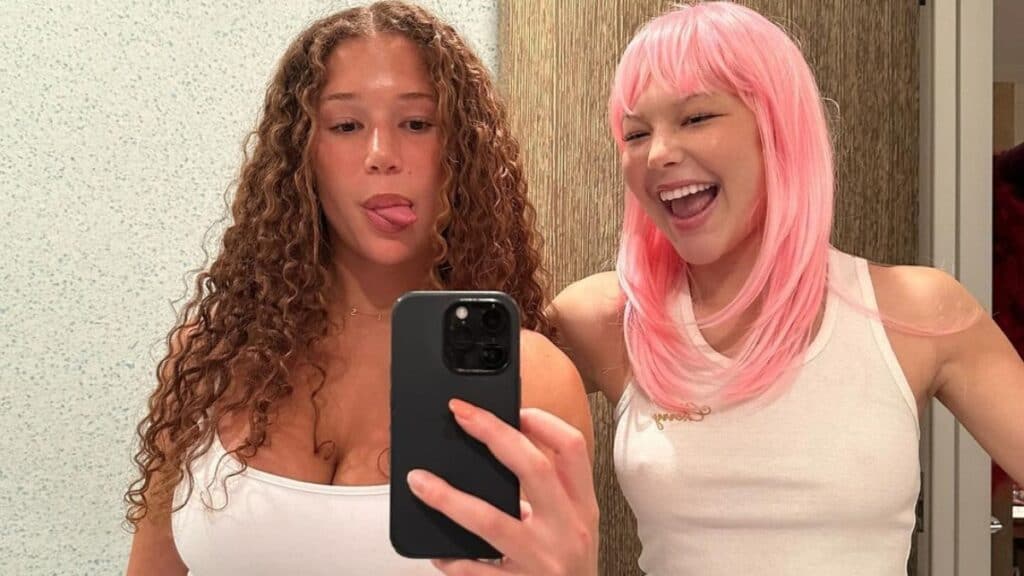 Sophia Strahan and sister Isabella Strahan in pink wig.