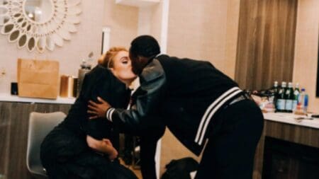 Adele and Rich Paul kissing