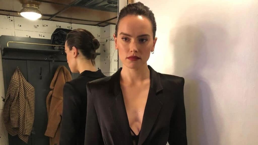 Daisey Ridley stands in her dressing room