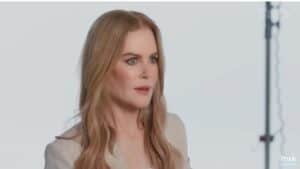 Nicole Kidman dressed in white, gives an interview discussing life with her husband and kids.