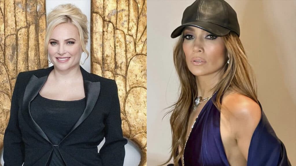 Meghan McCain in a black suit and Jennifer Lopez in a purple outfit and black cap