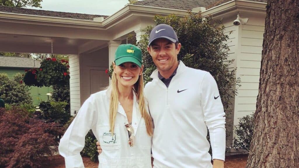 Rory McIlroy and his wife Erica Stoll in matching white outfits