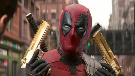 Deadpool with golden guns in Deadpool & Wolverine